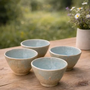 Set de cuencos artesanales de cerámica gres sobre mesa de madera — Moretto Cerámica